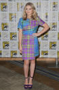 <p>The “Hunger Games” actress ditched Primrose Everdeen’s white blouse and wooly jumper for a purple, yellow and blue color-blocked dress. The 15-year-old chopped off her long locks moments before hitting the stage, debuting her new look. She wore purple eyeshadow to match her dress.</p>