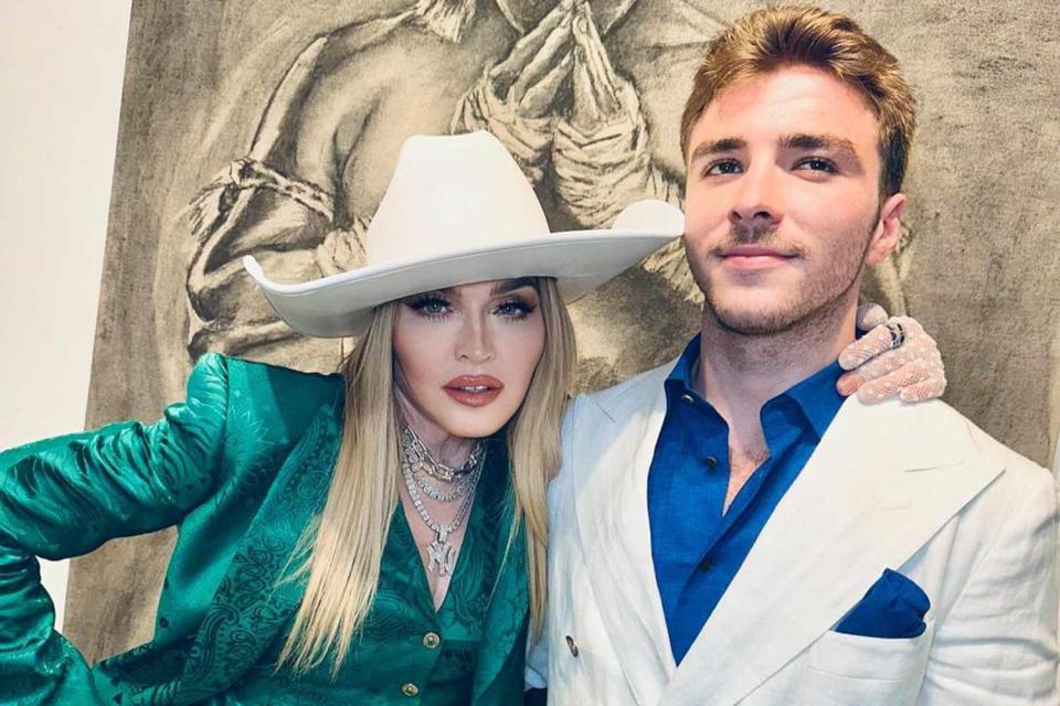 <p>Madonna/Instagram</p> Madonna and Rocco at his art exhibition in Miami 