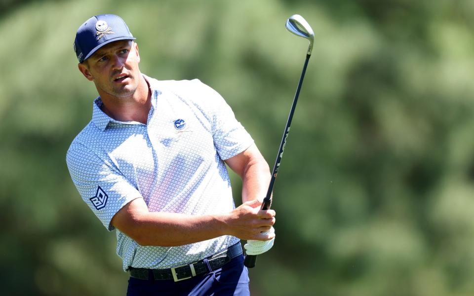 Bryson DeChambeau of the United States chips onto the eighth green during the second round of the 2024 Masters Tournament at Augusta National Golf Club on April 12, 2024 in Augusta, Georgia