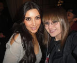 "Kim Kardashian and me. My friend again said "Hey Kim, do u know my friend Sarah?" and she said "of course I know Sarah!" She is such a sweetheart! Her and her sisters are great!"