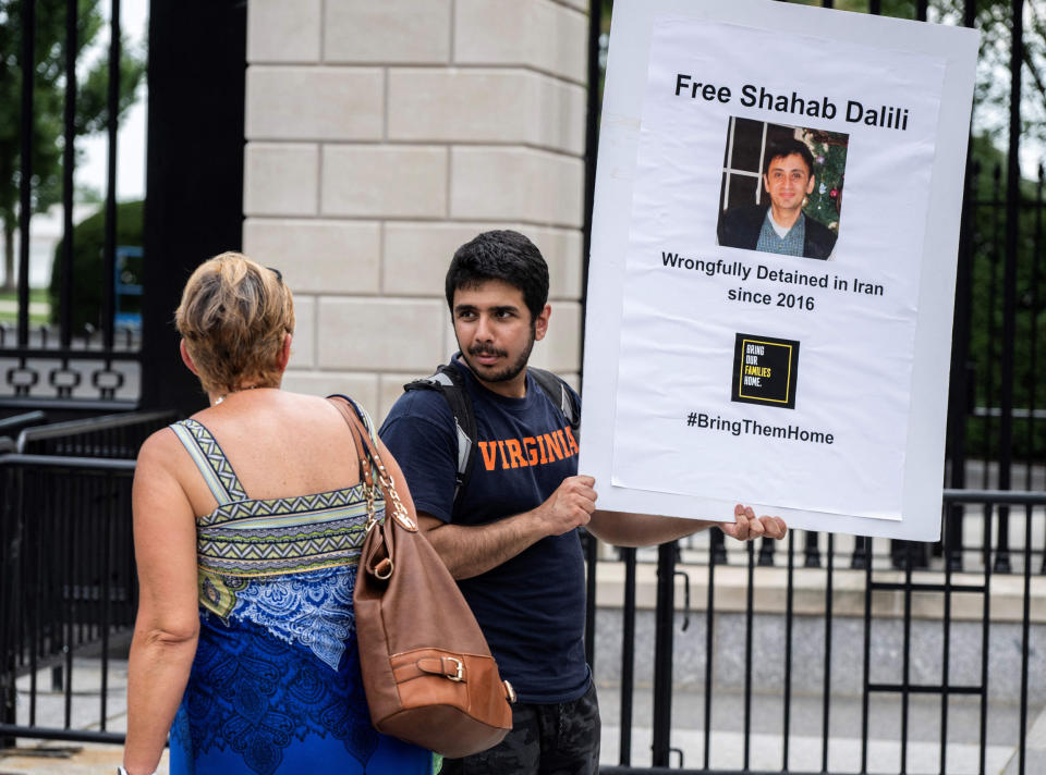 Darian Dalili protests outside the White House on Aug, 14, 2023, as he calls for the release of his father, Shahab Dalili. (Andrew Cabalerro-Reynolds / AFP via Getty Images file)