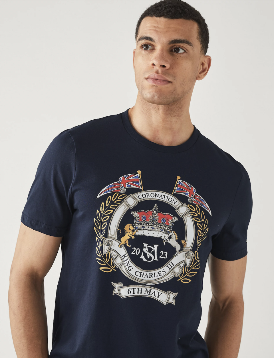 <p><a href="https://go.redirectingat.com?id=74968X1596630&url=https%3A%2F%2Fwww.marksandspencer.com%2Fus%2Fpure-cotton-coronation-graphic-t-shirt%2Fp%2FP60611500.html%23index%3D0&sref=https%3A%2F%2Fwww.townandcountrymag.com%2Fsociety%2Ftradition%2Fg43444233%2Fking-charles-coronation-merch-memorabilia-souvenirs%2F" rel="nofollow noopener" target="_blank" data-ylk="slk:Shop Now;elm:context_link;itc:0;sec:content-canvas" class="link ">Shop Now</a></p><p>Coronation Graphic T-Shirt</p><p>$27.99</p><p>marksandspencer.com</p>