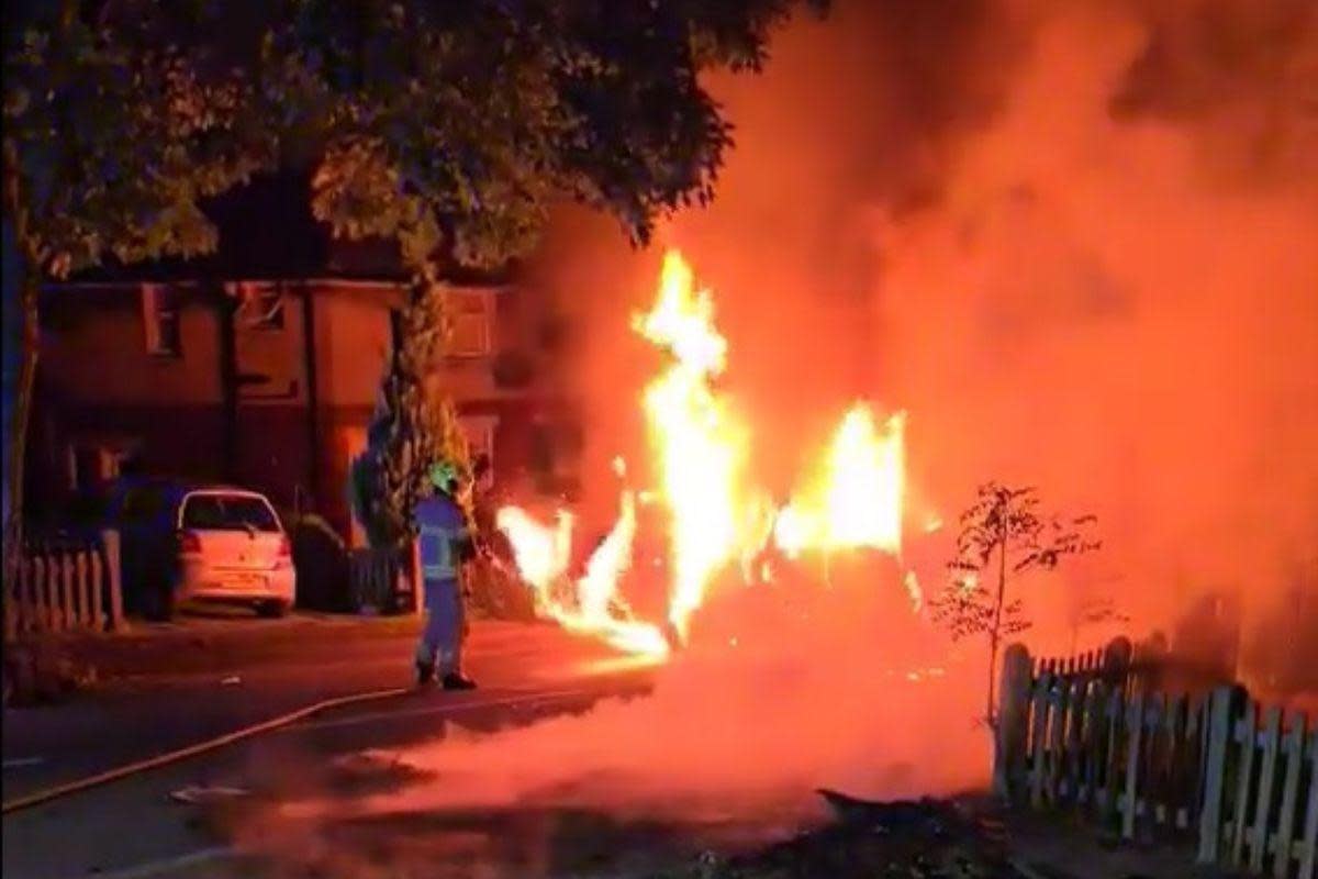 Dramatic image shows a firefighter tackling a blaze in Hathaway Avenue, Bradford <i>(Image: UGC)</i>