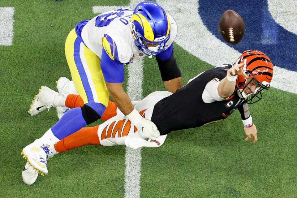 Los Angeles Rams defensive end Aaron Donald sacks Cincinnati Bengals quarterback Joe Burrow