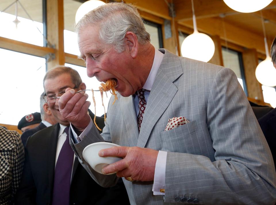 King Charles in April 2017 tasting pasta in Italy.