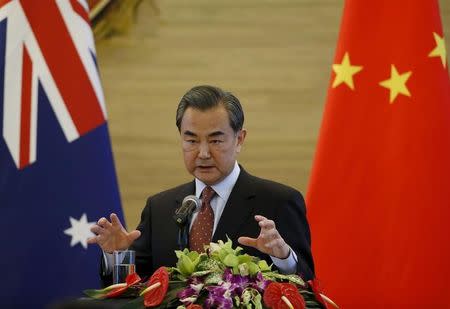 Chinese Foreign Minister Wang Yi speaks at a joint news conference with Australian Foreign Minister Julie Bishop at the Ministry of Foreign Affairs in Beijing, China, February 17, 2016. REUTERS/Kim Kyung-Hoon