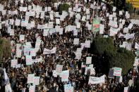 Houthi supporters rally against the United States' designation of Houthis as a foreign terrorist organisation, in Sanaa,