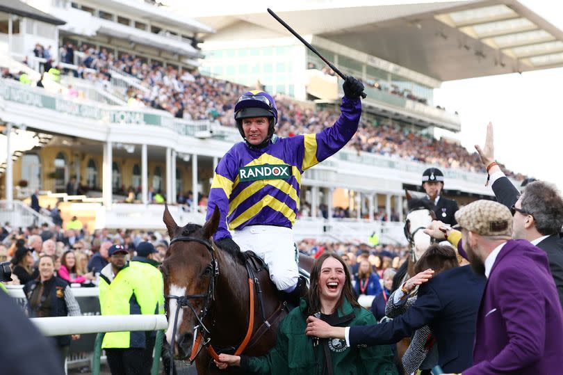 Derek Fox, riding Corach Rambler, celebrates winning the Randox Grand National Chase in 2023. (Photo by Michael Steele/Getty Images) -Credit:Getty Images