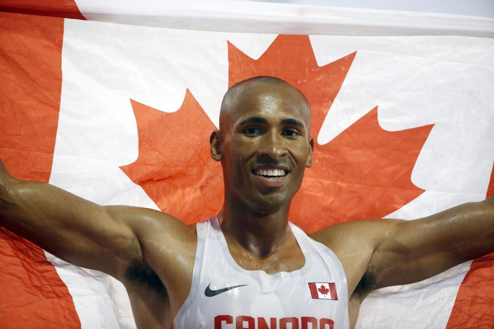  Damian Warner of Canada celebrates after he won the men&#39;s decathlon on July 23, 2015 in Toronto, Canada.  (Photo by Ezra Shaw/Getty Images)