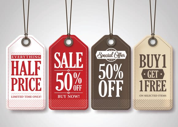 Multicolored sales tags displaying special deals.