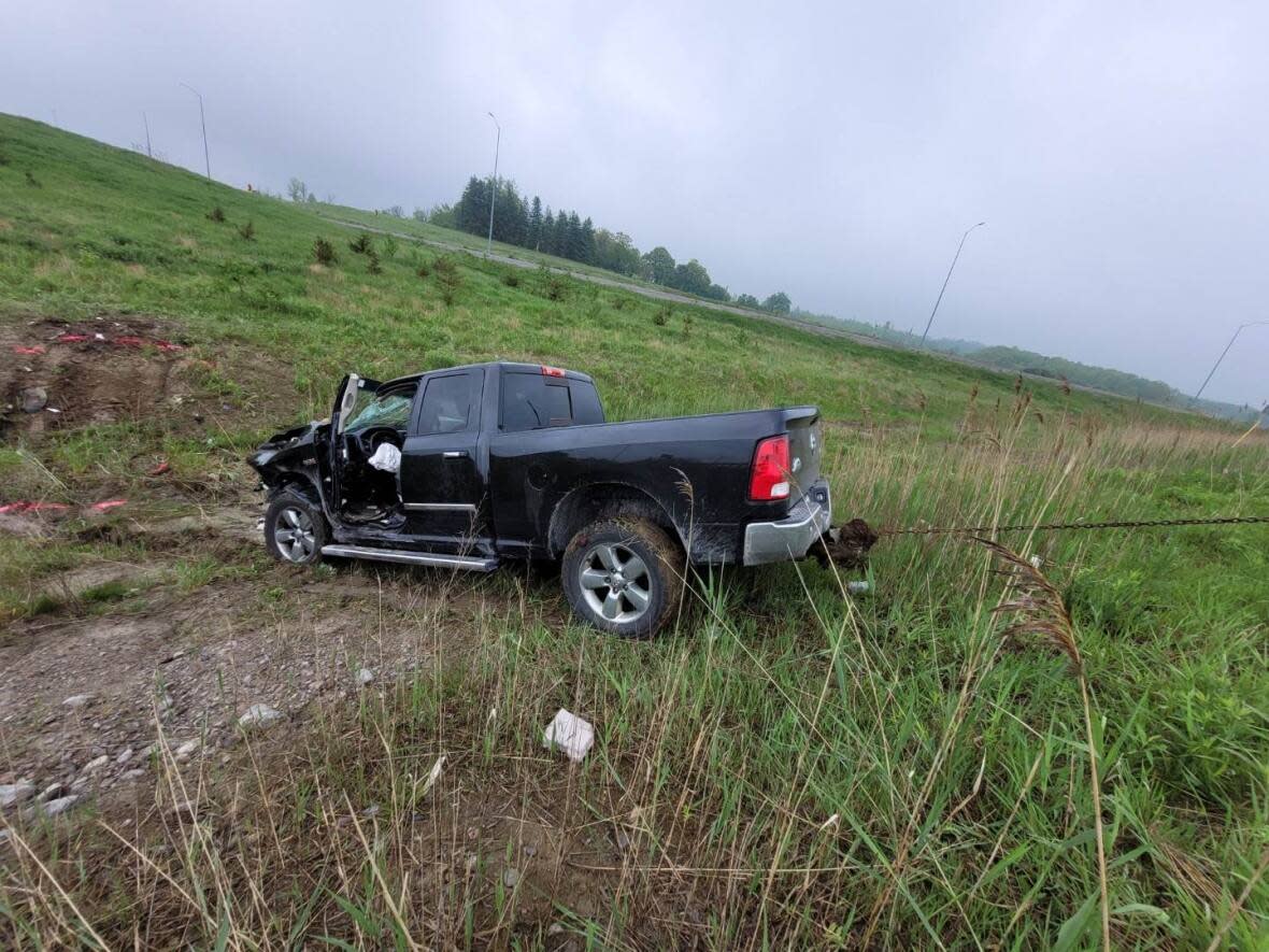 Police say a 32-year-old man from Ajax was found dead in a black pickup truck. They found the vehicle in a ditch off Highway 407 and Lake Ridge Road. (OPP - image credit)