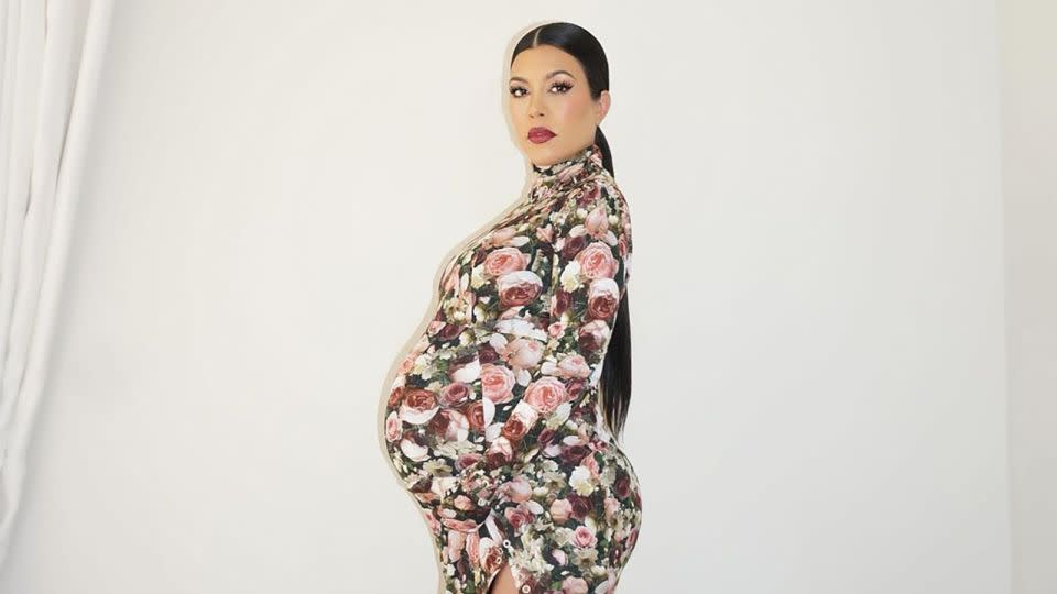 Kourtney Kardashian took advantage of her baby bump, going as pregnant Kim in a divisive Met Gala look from 2013. - From Kourtney Kardashian