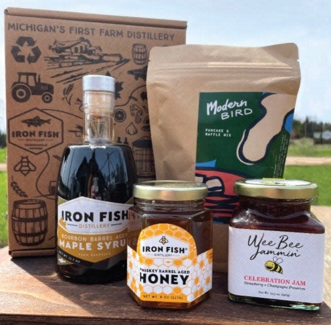 Iron Fish Distillery gift set features its Bourbon Barrel-aged Maple syrup