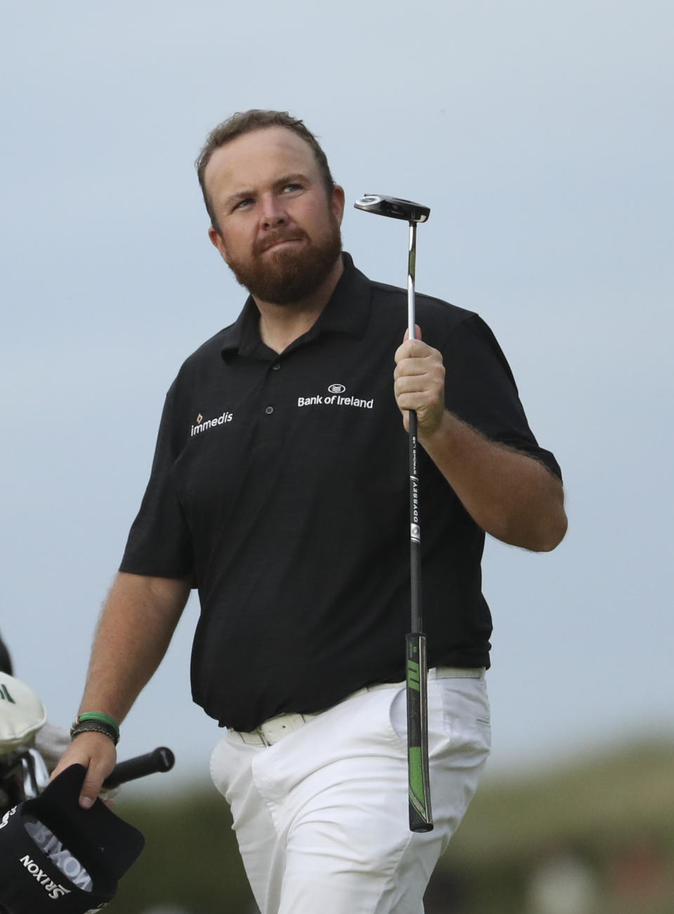 Ireland's Shane Lowry acknowledges the crowd as he walks onto the 18th green during the third round of the British Open Golf Championships at Royal Portrush in Northern Ireland, Saturday, July 20, 2019.(AP Photo/Peter Morrison)