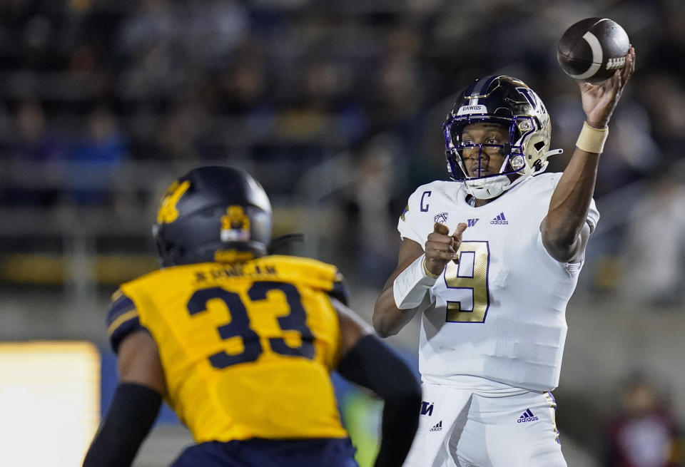 Washington quarterback Michael Penix Jr. (9) throws a pass against California during the first half of an NCAA college football game in Berkeley, Calif., Saturday, Oct. 22, 2022. (AP Photo/Godofredo A. Vásquez)