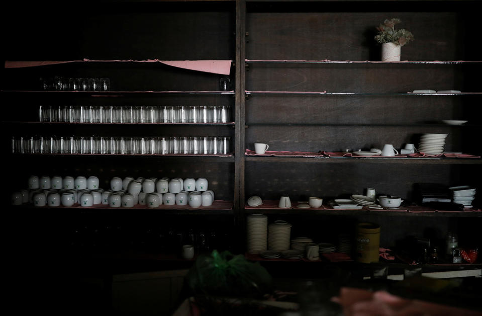 <p>Tableware lies on shelves at a restaurant of the abandoned Alps Ski Resort located near the demilitarized zone separating the two Koreas in Goseong, South Korea, Jan. 17, 2018. (Photo: Kim Hong-Ji/Reuters) </p>