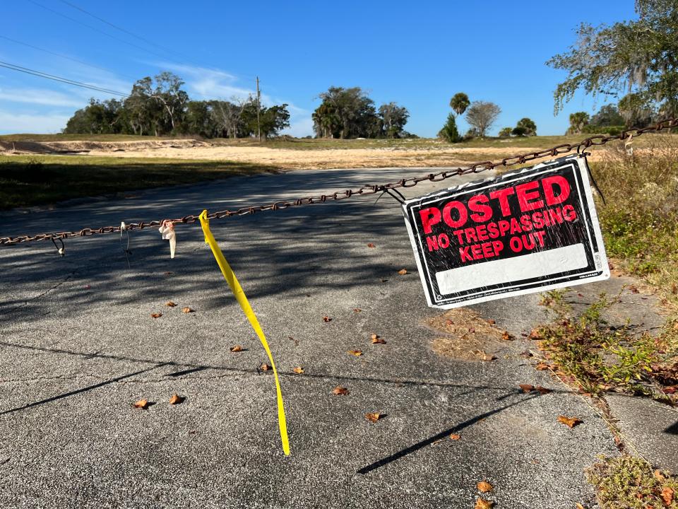 A "no trespassing" sign can be seen at the entrance to the former Tomoka Oaks golf course in Ormond Beach on Nov. 7, 2023. Developers want to turn the 147.9 acre property into a gated community called Tomoka Reserve which would be surrounded by the older non-gated 547-home Tomoka Oaks community. The developers on Nov. 21 announced plans to pursue "conventional zoning" that would allow up to 317 house lots.