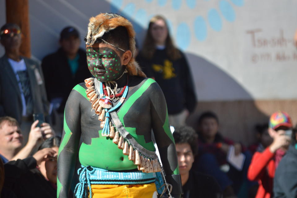 A dancer with the Acoma Sky City Ram Dancers from Acoma Pueblo, N.M. performs on Monday, Oct. 14, 2019 at the Indian Pueblo Cultural Center in Albuquerque, N.M. as part of New Mexico's first Indigenous Peoples Day. A handful of states celebrated Monday their first Indigenous Peoples Day on Monday as part of a trend to move away from a day honoring Christopher Columbus. (AP Photo/Russell Contreras)