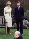 <p>The royal mom put her own spin on a white turtleneck sweater by cinching it at the waist.</p>