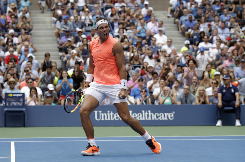 Rafael Nadal, of Spain, reacts after defeating Nikoloz Basilashvili, of Georgia, during the fourth round of the U.S. Open tennis tournament, Sunday, Sept. 2, 2018, in New York. (AP Photo/Carolyn Kaster)