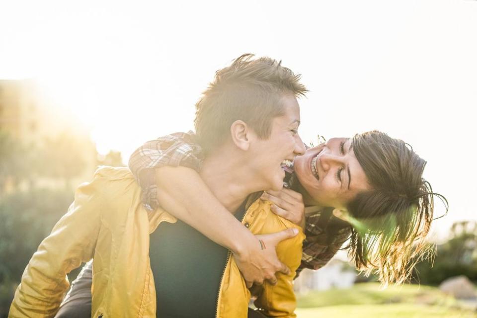 two women laughing together