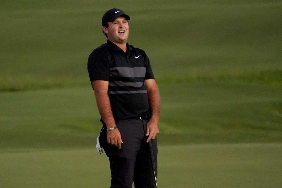 Patrick Reed reacts to missing his putt on the third playoff hole on the 18th green during final round of the Tournament of Champions golf event, Sunday, Jan. 5, 2020, at Kapalua Plantation Course in Kapalua, Hawaii. (AP Photo/Matt York)