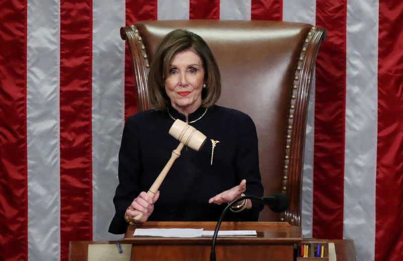 FILE PHOTO: U.S. House of Representatives votes on Trump impeachment on Capitol Hill in Washington