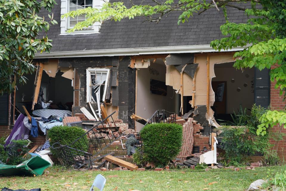 Authorities used a battering ram attached to an armored vehicle to tear off the front of a Charlotte, North Carolina, home that was the site of a shooting incident in which four law enforcement officers were killed while attempting to serve a warrant on April 29.