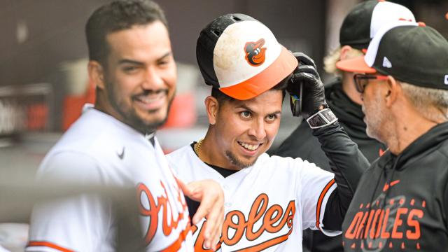 With bat and glove, Urías leads Orioles over Yankees 7-6