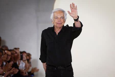 Designer Ralph Lauren acknowledges the crowd after presenting his Spring/Summer 2015 collection during New York Fashion Week September 11, 2014. REUTERS/Lucas Jackson