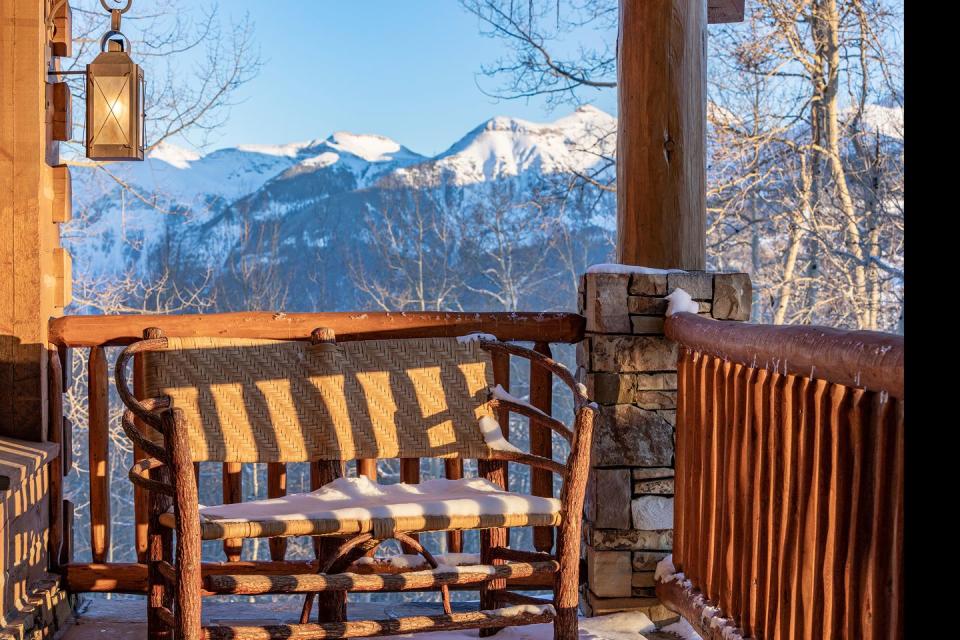 2) Views of the nearby mountain range can be seen from an array of balconies and patios.