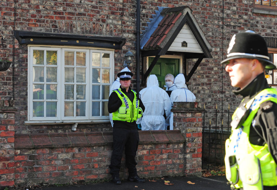 Police forensic officers entering the home of Claudia Lawrence in Heworth, York, in October 2013. (PA)
