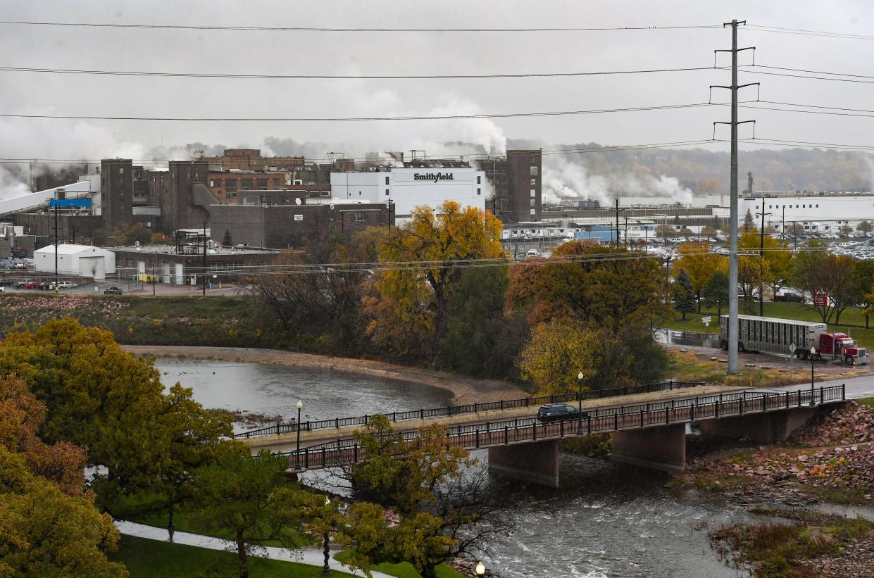 Plumes of steam rise from the Smithfield meat packing plant on Wednesday, October 27, 2021, in Sioux Falls.