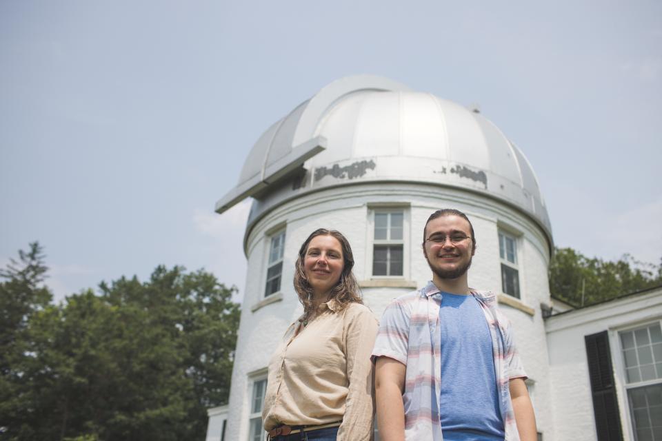 Elisabeth Newton and Jack Duranceau stand in front of Dartmouth's Shattuck Observatory on July 18, 2023. Duranceau, a recent graduate, discovered two exoplanets as part of his senior thesis, with help and direction from Newton, an assistant professor of astronomy and physics.