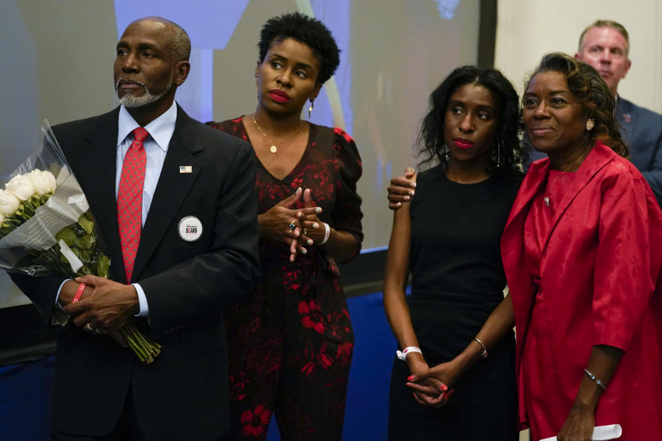 Lt. Gov. Gov.-elect Winsome Sears and her family watch as Virginia Gov.-elect Glenn Youngkin speaks at an election night party in Chantilly, Va., early Wednesday, Nov. 3, 2021, after he defeated Democrat Terry McAuliffe. (AP Photo/Andrew Harnik)