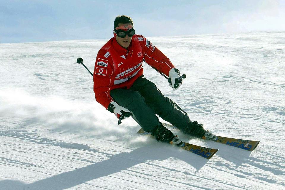 Then Ferrari's Michael Schumacher skis during a stay in the northern Italian resort of Madonna Di Campiglio in this January 16, 2004 file photo. Formula One champion Michael Schumacher suffered a serious head injury while skiing in the French Alps resort of Meribel, French media reported on December 29, 2013. REUTERS/Pool (ITALY - Tags: SPORT MOTORSPORT F1 DISASTER)