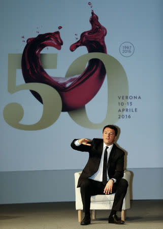 Italy's Prime Minister Matteo Renzi gestures as he speaks during a news conference with Founder and Executive Chairman of Alibaba Group Jack (unseen) at the Vinitaly wine exhibition in Verona, Italy, April 11 2016. REUTERS/Stefano Rellandini