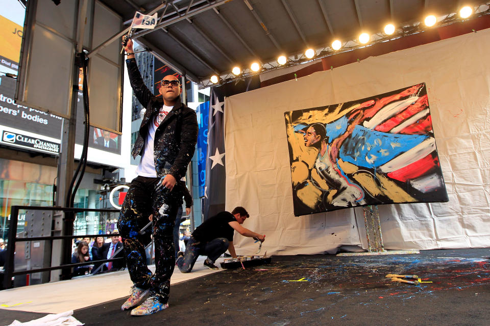 NEW YORK, NY - APRIL 18: Performance artist David Garibaldi performs his art on stage during the Team USA Road to London 100 Days Out Celebration in Times Square on April 18, 2012 in New York City. (Chris Trotman/Getty Images for USOC)