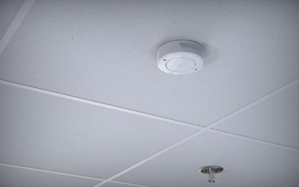 Triton Sensors look similar to smoke detectors and can be installed in locker rooms and bathrooms.