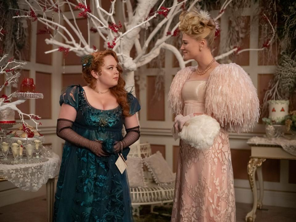 Nicola Coughlan as Penelope Featherington and Jessica Madsen as Cressida Cowper in episode one of Bridgerton season 3.