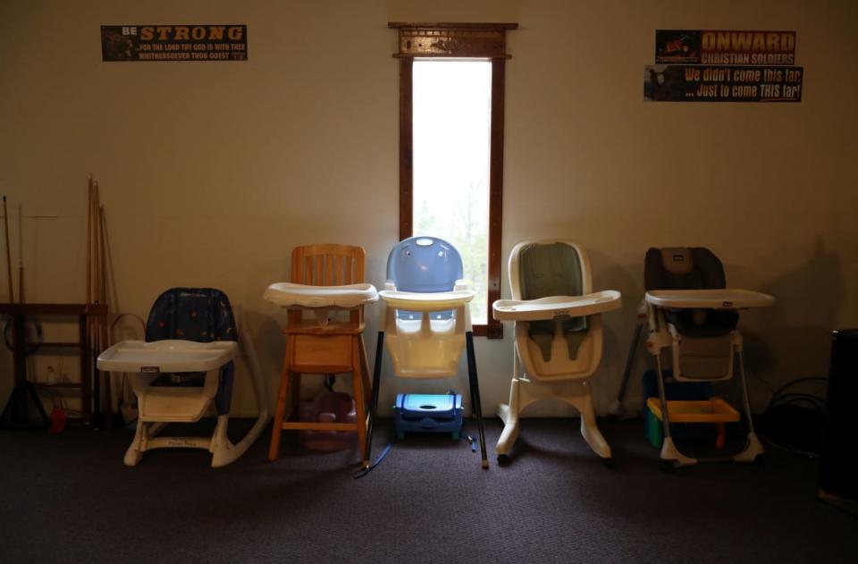 <div class="inline-image__caption"><p>High chairs are seen in a building owned by The Knights Party, a white nationalist group formerly named the Knights of the Ku Klux Klan, outside Harrison, Arkansas, in 2018.</p></div> <div class="inline-image__credit">REUTERS/Jim Urquhart </div>