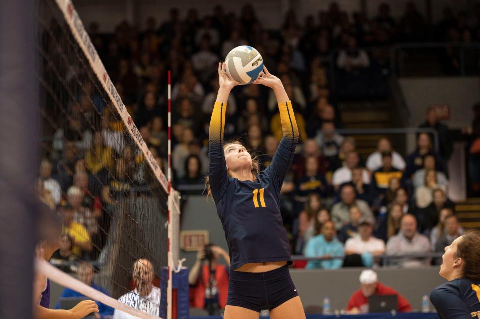 Pewamo-Westphalia junior Taylor Smith sets the ball during the Division 3 State Final match against Kalamazoo Christian at Kellogg Arena on Saturday, Nov. 19, 2022.