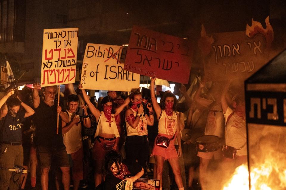 Israelis protest in Tel Aviv on Saturday demanding a hostage swap and the removal of the Netanyahu government (Anadolu via Getty)