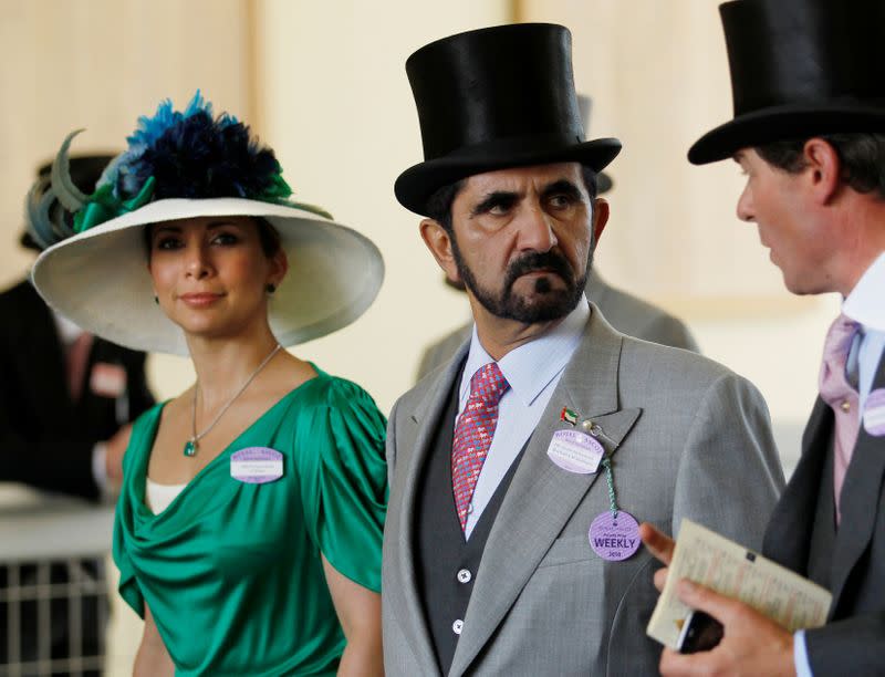 FILE PHOTO: Jordanian Princess Haya bint Al-Hussein and husband Dubai ruler Sheikh Mohammed bin Rashid al-Maktoum walk to the parade ring on Ladies Day the third day of racing at Royal Ascot in southern England