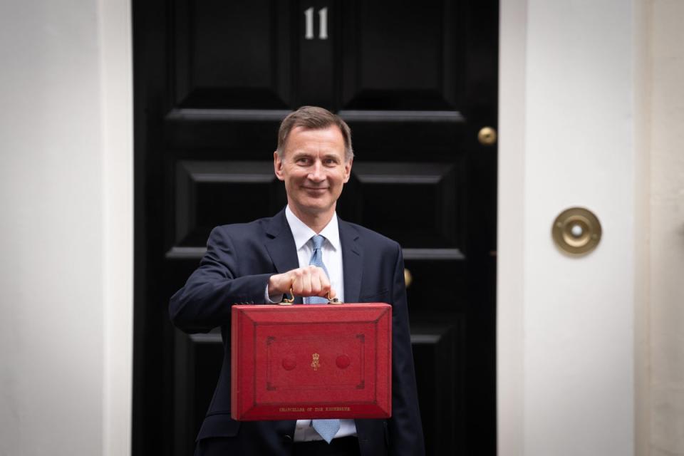 Chancellor of the Exchequer Jeremy Hunt leaves 11 Downing Street on his way to deliver his Budget in March (Stefan Rousseau / PA Wire)