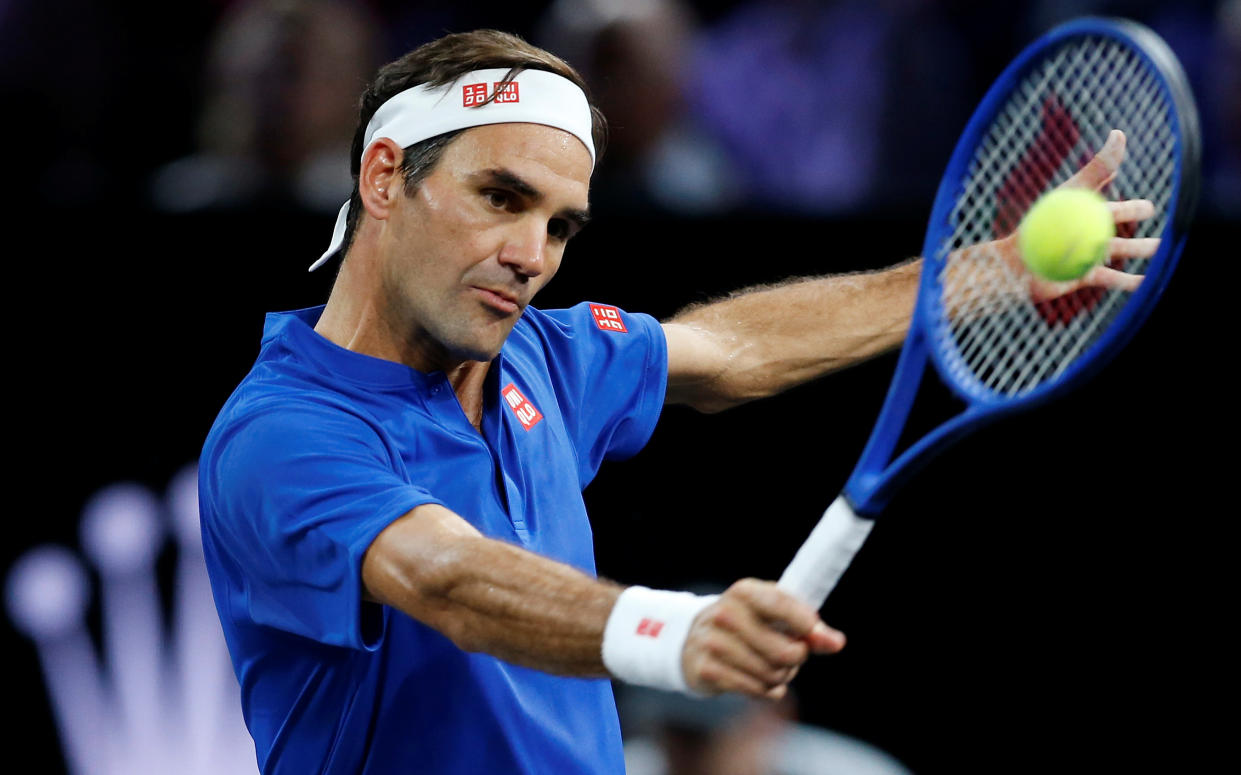 Tennis - Laver Cup - Palexpo, Geneva, Switzerland - September 22, 2019  Team Europe's Roger Federer in action during his singles match against Team World's John Isner  REUTERS/Pierre Albouy