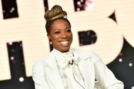 Yvonne Orji's box braid style has no boundaries, and she makes the style look killer every time. In this instance, she's wrapped her braids into a stylish topknot on the top of her head — less “running out to the gym,” more “running out to a Paris fashion show.”