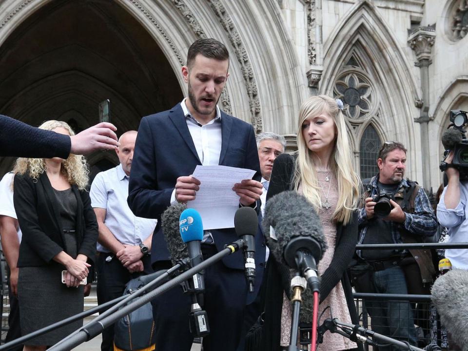Charlie Gard’s parents address the media outside the High Court today (PA)