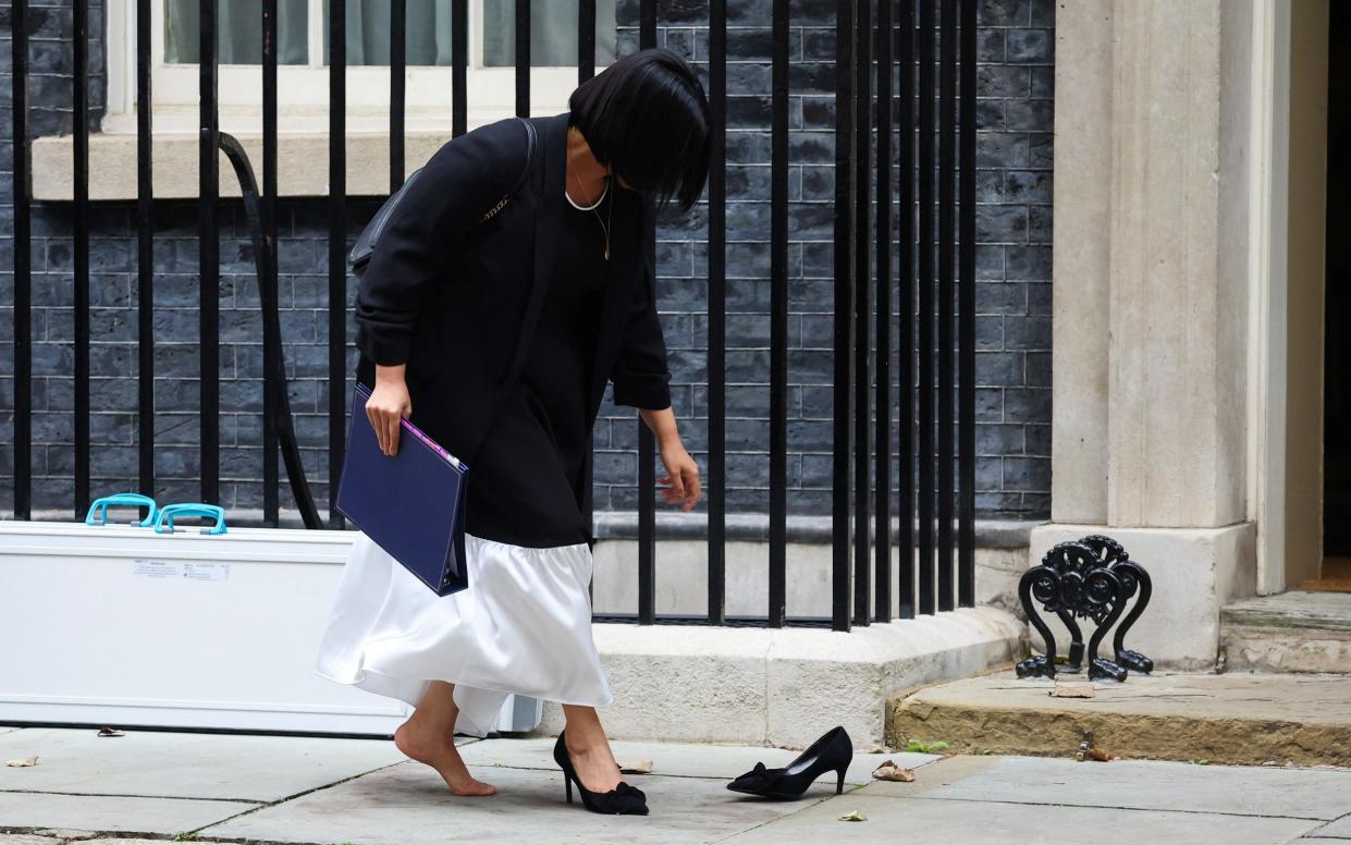 Lord Chancellor and Secretary of State for Justice Shabana Mahmood retrieves her shoe after losing it from her foot outside 10 Downing Street