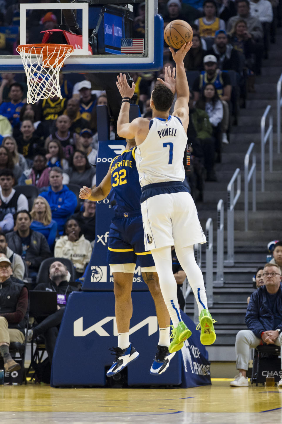 Dallas Mavericks center Dwight Powell (7) takes a 3-point shot against the Golden State Warriors during the first half of an NBA basketball game in San Francisco, Saturday, Dec. 30, 2023. (AP Photo/John Hefti)